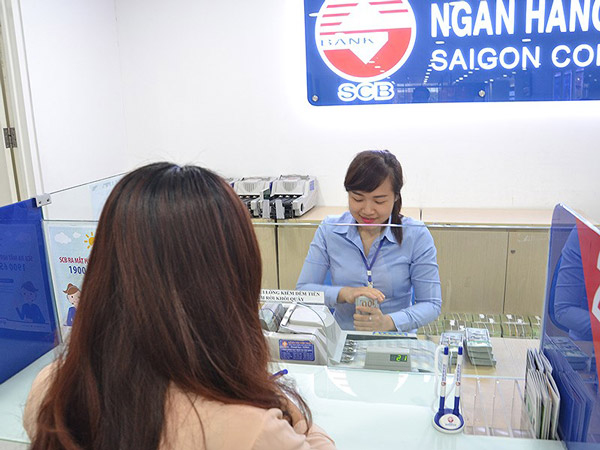 "Tỉ giá đang có lợi cho người giữ tiền Việt Nam" - 2