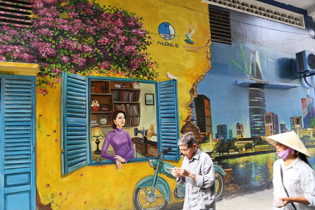 Bức tường xấu xí giữa phố Sài Gòn thành tranh 3D nghệ thuật - 3