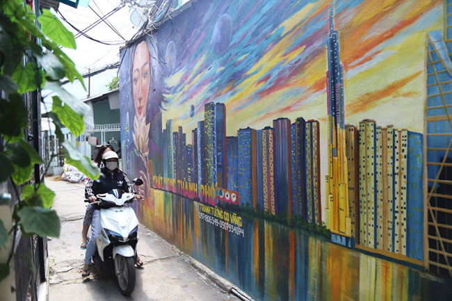 Bức tường xấu xí giữa phố Sài Gòn thành tranh 3D nghệ thuật - 5