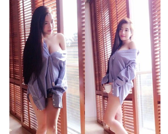 Elly Trần xuất hiện sexy toàn phần với kiểu áo sơ mi trễ vai thế này.&nbsp;