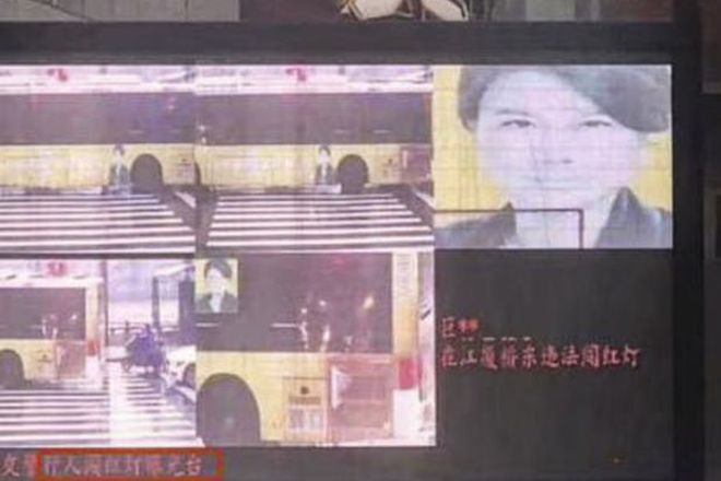 Hệ thống giám sát Trung Quốc &#34;nhìn gà hoá cuốc&#34; ảnh người vi phạm giao thông - 1
