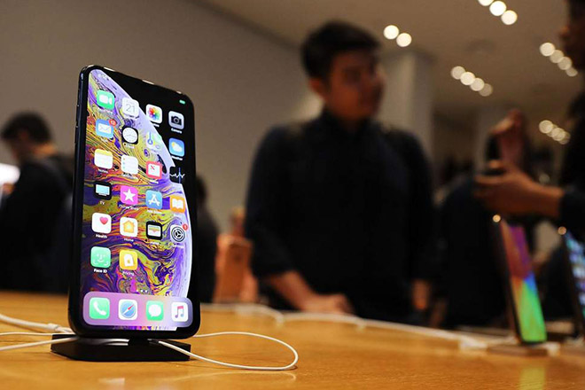 Người dùng Mỹ có thể cắn răng chi thêm hàng triệu đồng mua iPhone - 1