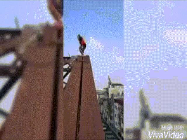 Bạn trẻ - Cuộc sống - 2 thanh niên leo lên đỉnh cầu Long Biên nhào lộn gây sốc