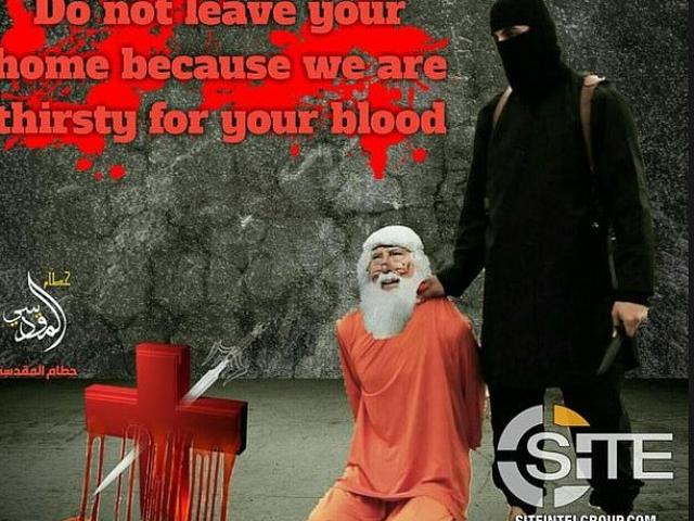 Thế giới - IS tung ảnh khống chế ông già Noel ngay trước vụ xả súng đẫm máu ở Pháp