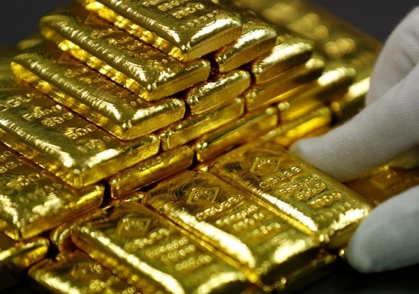 Giá vàng hôm nay 14/12: Vàng lình xình đợi quyết định mới - 1