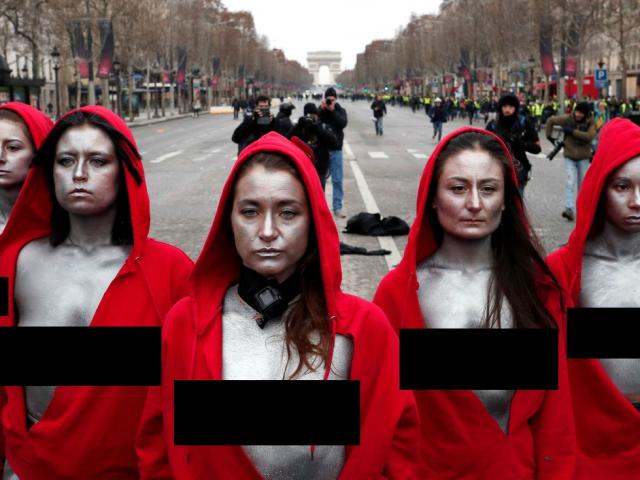 Phụ nữ ngực trần tham gia biểu tình áo vàng, đối đầu cảnh sát Paris