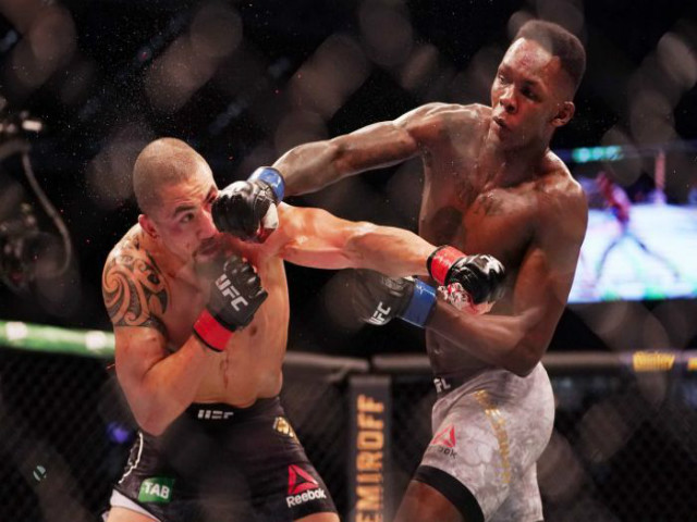 Thể thao - UFC uy chấn võ lâm: Nhận 1 đòn trả 2 đấm knock-out để lên ngôi mãn nhãn