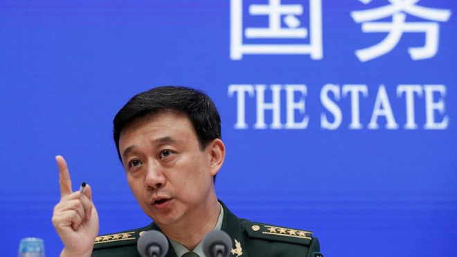 Người phát ngôn Bộ Quốc phòng Trung Quốc Ngô Khiêm trong một buổi họp báo tại Bắc Kinh ngày 24-6-2019. Ảnh: AP