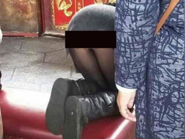 Bạn trẻ - Cuộc sống - Mặc đồ quá ngắn đi lễ chùa, cô gái bị ném đá dữ dội