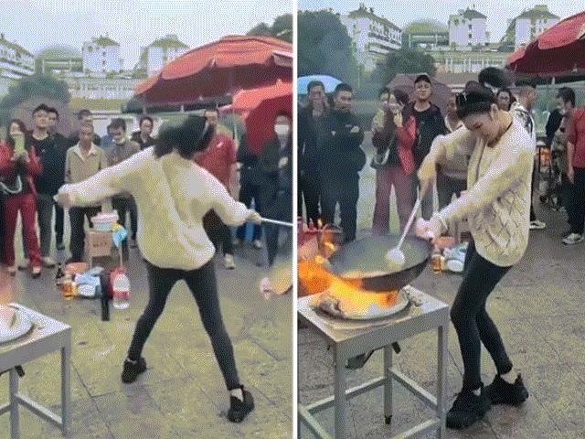Bạn trẻ - Cuộc sống - Clip: Cô gái nhún nhảy quay chảo cực đỉnh khi rang cơm "gây sốt"