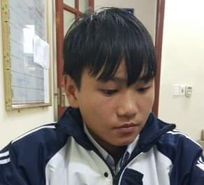 Nghi phạm Giàng Seo Nhà tại trụ sở công an.