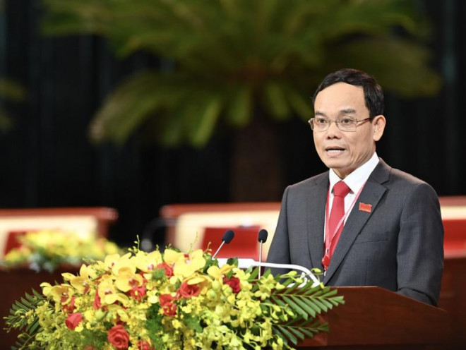 Ông Trần Lưu Quang, Phó Bí thư Thường trực Thành ủy TP.HCM công bố quyết định của Bộ Chính trị. Ảnh: PV
