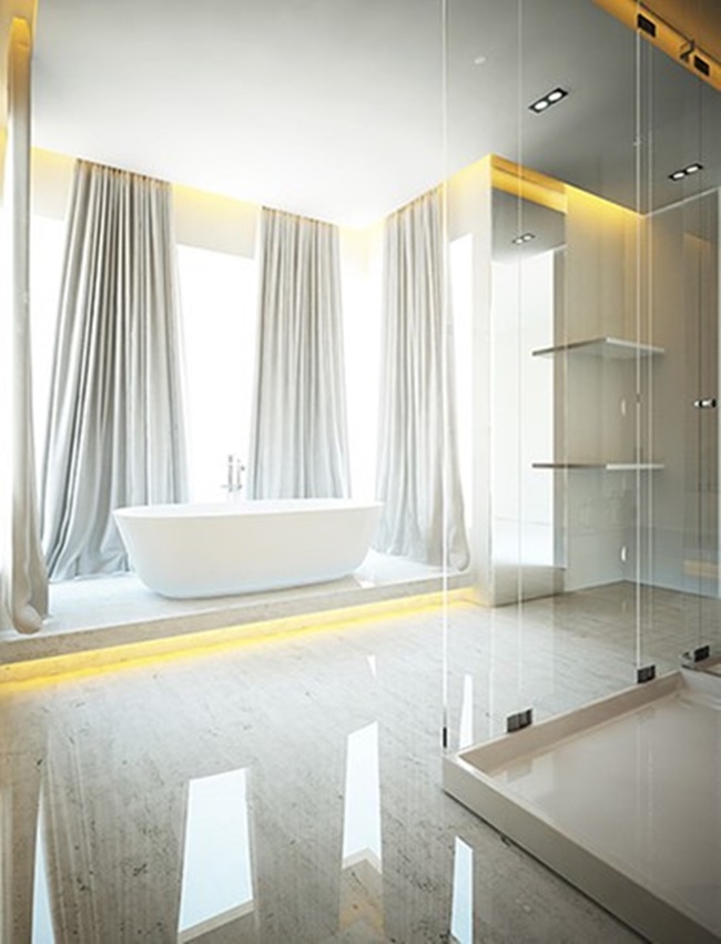 Không gian phòng tắm rộng rãi với bồn tắm màu trắng. 
