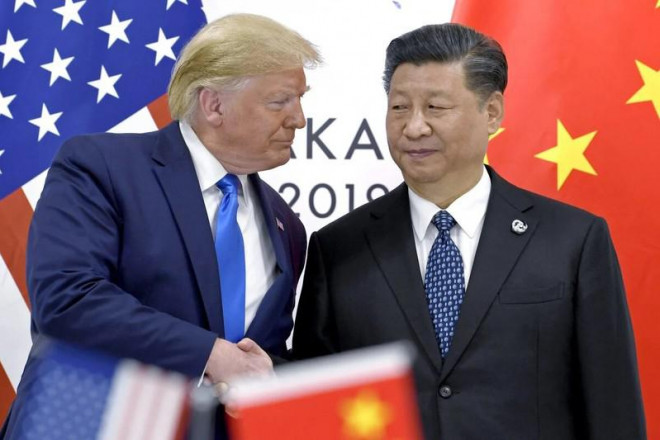 Tổng thống Mỹ Donald Trump (trái) và Chủ tịch Trung Quốc Tập Cận Bình tại Hội nghị thượng đỉnh G20 năm 2019 ở Nhật Bản. Ảnh: AP