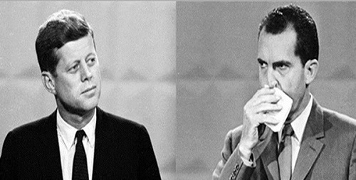 Ông Nixon (phải)&nbsp;liên tục lau mặt trong cuộc tranh luận trực tiếp đầu tiên.