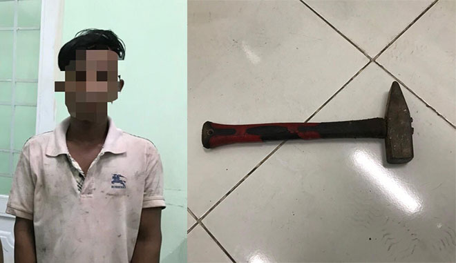 Sơn Ngọc Sê tại cơ quan công an cùng tang vật là cây búa