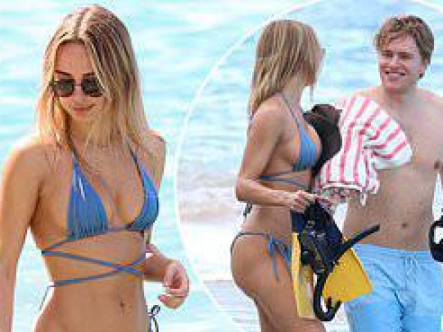 Làm đẹp - Mẫu áo tắm Kimberley Garner gợi cảm ngất ngây, đi biển cùng trai lạ