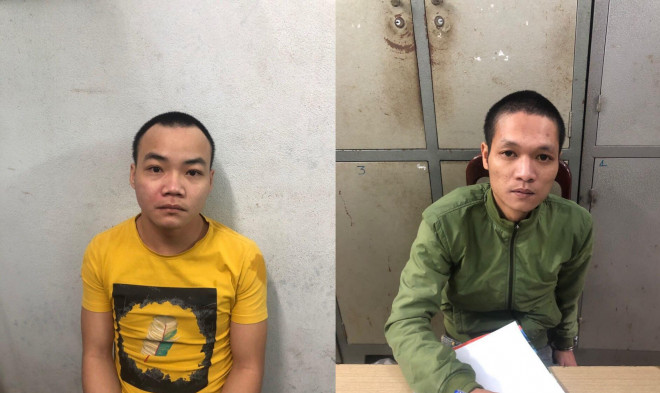 Phạm Văn Minh (trái) và Lưu Minh Dương tại cơ quan công an
