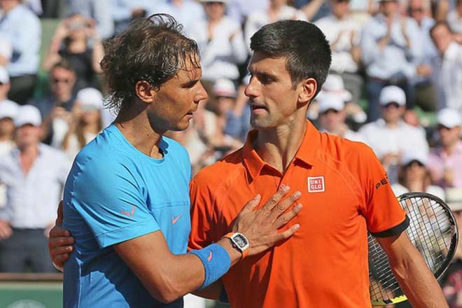 Nadal (trái) muốn đánh bại Djokovic trên đất Úc