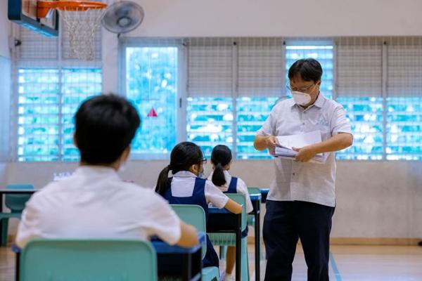 Học sinh ở Singapore đang thi tốt nghiệp tiểu học. Ảnh: Bộ Giáo dục Singapore.