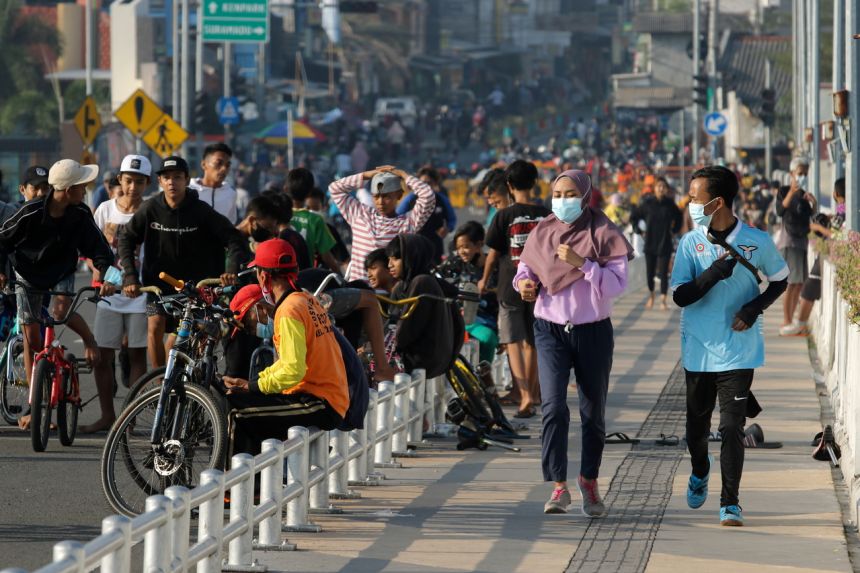 Thành phố Blitar ở Indonesia sẽ "trở lại cuộc sống bình thường" vào tuần tới trong bối cảnh quốc gia Đông Nam Á này đang thử nghiệm sống chung với Covid-19. Ảnh: Reuters
