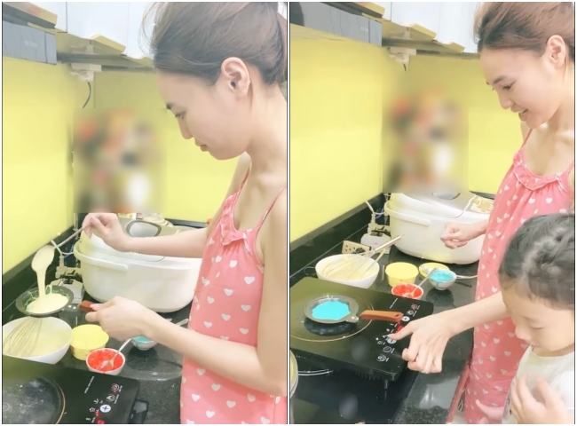 Thừa nhận không giỏi chuyện bếp núc nhưng Ninh Dương Lan Ngọc vẫn vào bếp làm bánh cho các cháu. Cô nàng diện bộ váy hai dây màu hồng dễ thương, tóc cột gọn gàng và&nbsp;mặt mộc xinh đẹp.
