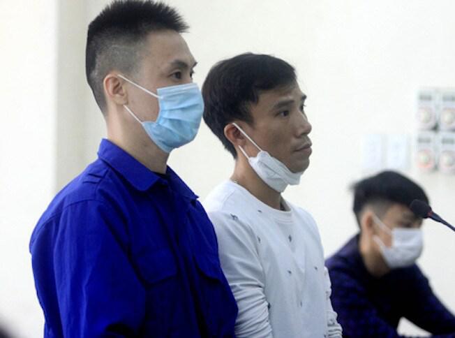 Bị cáo Bùi Xuân Đại và Trần Xuân Hải tại phiên tòa.
