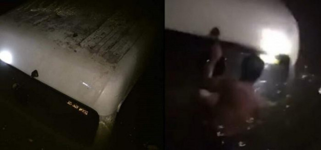 Hình ảnh chiếc xe ô tô chở 5 công nhân trên đường đi làm về đêm 21 rạng sáng 22/10 lao xuống “kênh nước” đang được người dân ứng cứu đăng tải trên mạng xã hội gây xôn xao
