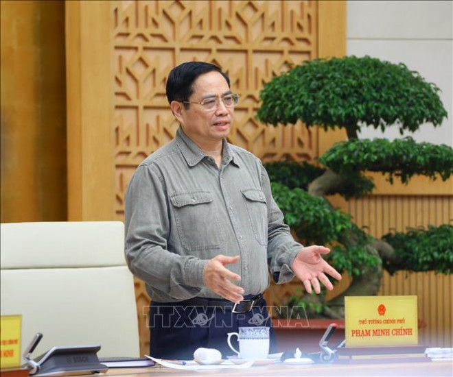 Thủ tướng Phạm Minh Chính phát biểu mở đầu phiên họp Chính phủ thường kỳ tháng 10-2021 - Ảnh: TTXVN