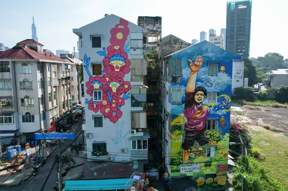用吊車在胡志明市的公寓牆上畫了一幅巨大的畫。HCM - 6