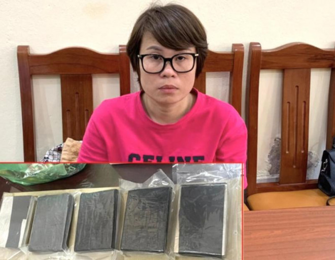 Lương Thị Thoa cùng 5 bánh heroin tang vật.