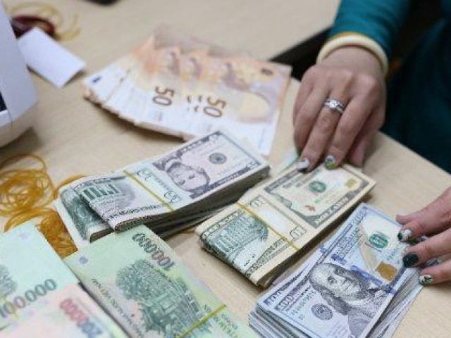 Kinh doanh - Ngân hàng Nhà nước nới biên độ tỷ giá giao ngay giữa VND và USD