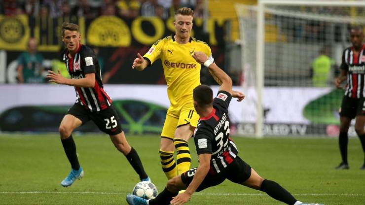 Dortmund (áo vàng) giành chiến thắng quan trọng