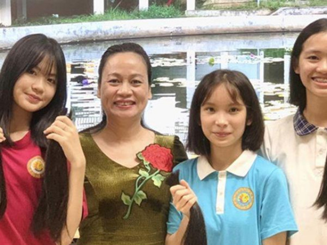 Bạn trẻ - Cuộc sống - Nhiều nữ sinh của một lớp học hiến tóc vì bệnh nhân ung thư