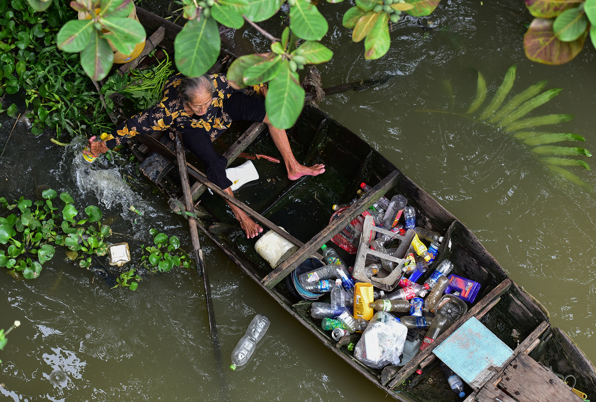 Cuộc sống cô độc của cụ bà 74 tuổi lênh đênh trên thuyền giữa Sài Gòn - 4