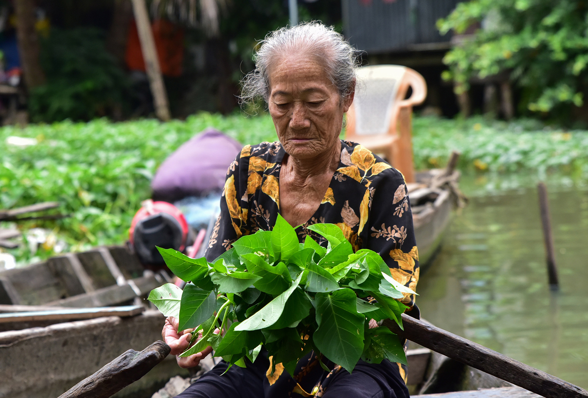 Cuộc sống cô độc của cụ bà 74 tuổi lênh đênh trên thuyền giữa Sài Gòn - 9