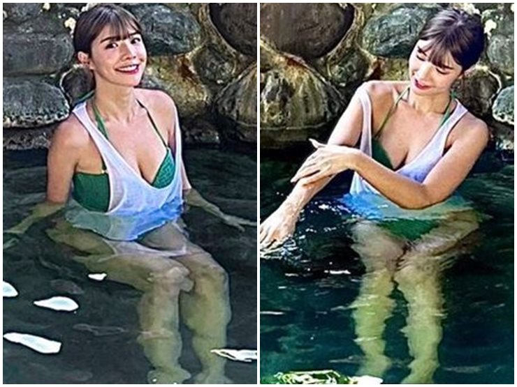 Giải trí - MC diện bikini tắm suối lộ vòng 1 "khủng" gây bão MXH