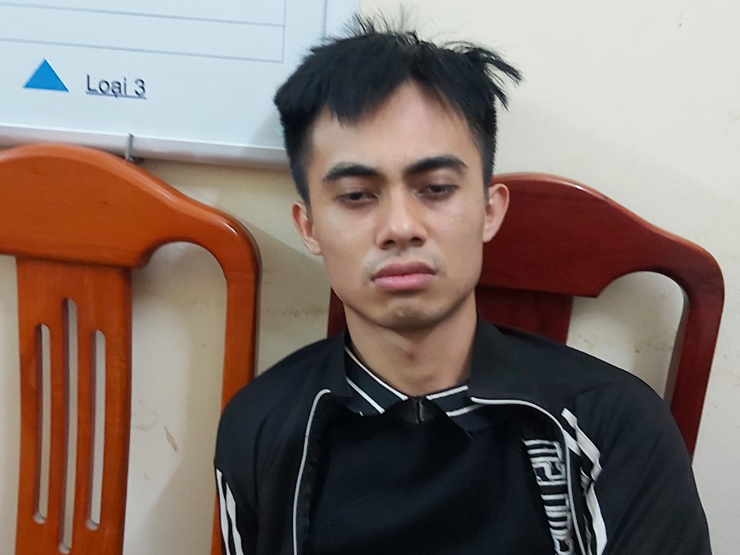 Thân Văn Hiếu tại trụ sở công an.