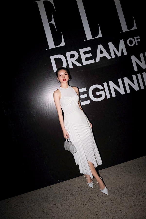 Quỳnh Lương quyến rũ trong thiết kế vạt thấp vạt cao.