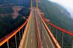 Kinh doanh - Cây cầu hoành tráng hơn 1.400 tỷ, cao bằng tòa nhà trăm tầng sừng sững giữa núi non