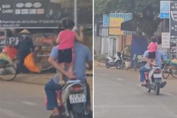 Clip: Người đàn ông chở bé gái làm xiếc trên đường