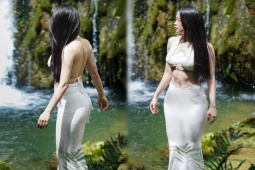 Thời trang - Nữ MC "Chuyển động 24h" tôn đường cong như vẽ khi diện đầm táo bạo bên thác nước