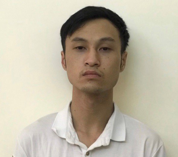 Lê Xuân Bách tại cơ quan công an. Ảnh: CATB