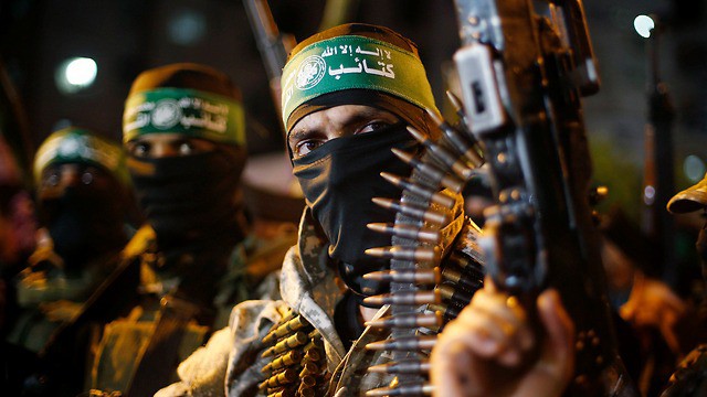 Các tay súng Hamas được cho là đang "dụ" binh sĩ Israel vào Dải Gaza. Ảnh minh họa: Reuters