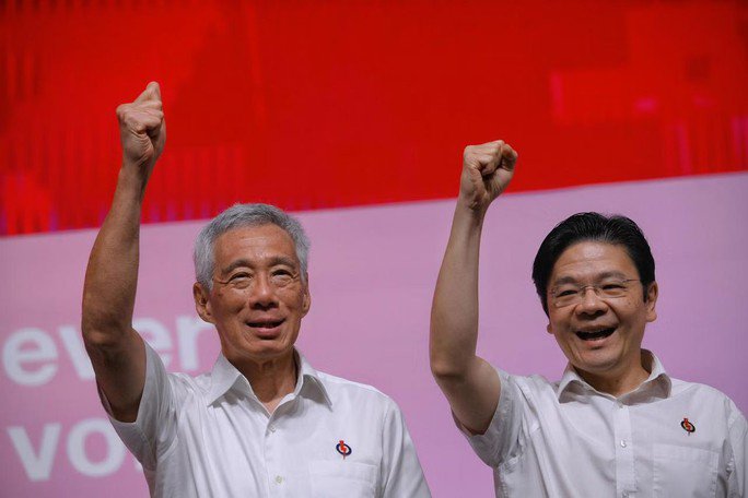 Thủ tướng Lý Hiển Long (trái) và Phó Thủ tướng Lawrence Wong tại Hội nghị thường niên của PAP ở Singapore ngày 5-11 Ảnh: THE STRAITS TIMES