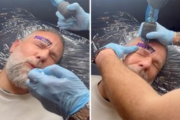 Bạn trẻ - Cuộc sống - Thua cá cược với con trai, ông bố xăm chữ to đùng lên mặt