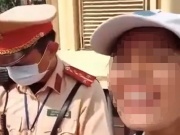 Tin tức trong ngày - Quay clip nói &quot;em yêu anh&quot; trêu CSGT, người phụ nữ phải viết cam kết