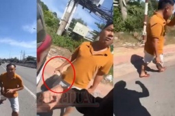 Clip: Cán bộ cảnh sát giao thông mặc đồ thường chửi thề, cầm gạch đá định đánh người