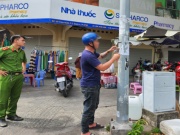 Tin tức trong ngày - Được thuê 100.000 đồng dán quảng cáo, thanh niên bị phạt 1,5 triệu đồng