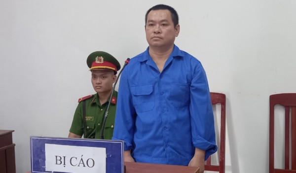 Trần Thiên Tân&nbsp;tại phiên tòa vào sáng 13/12. Ảnh: Thế Minh
